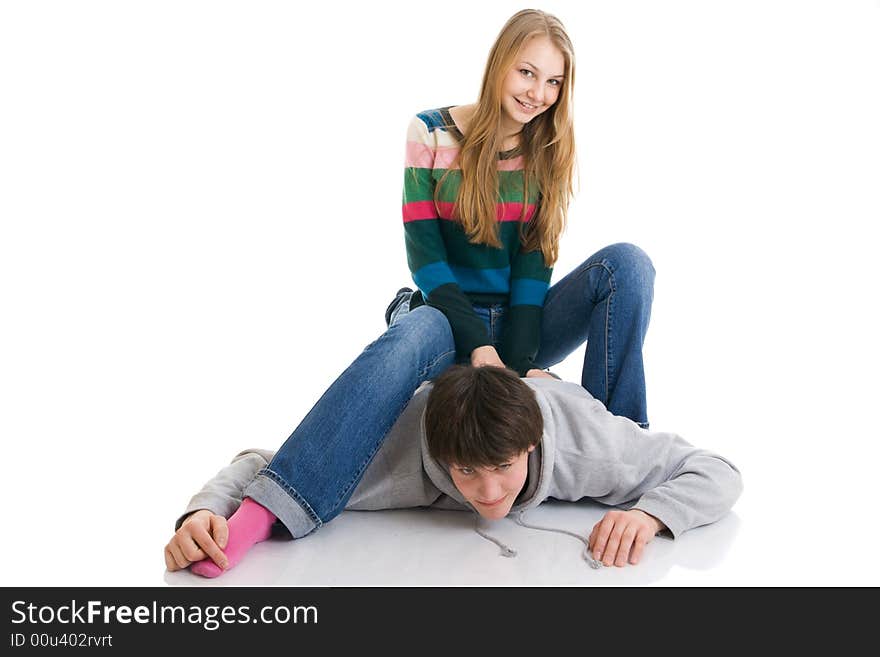 The Happy Young Couple Isolated On A White