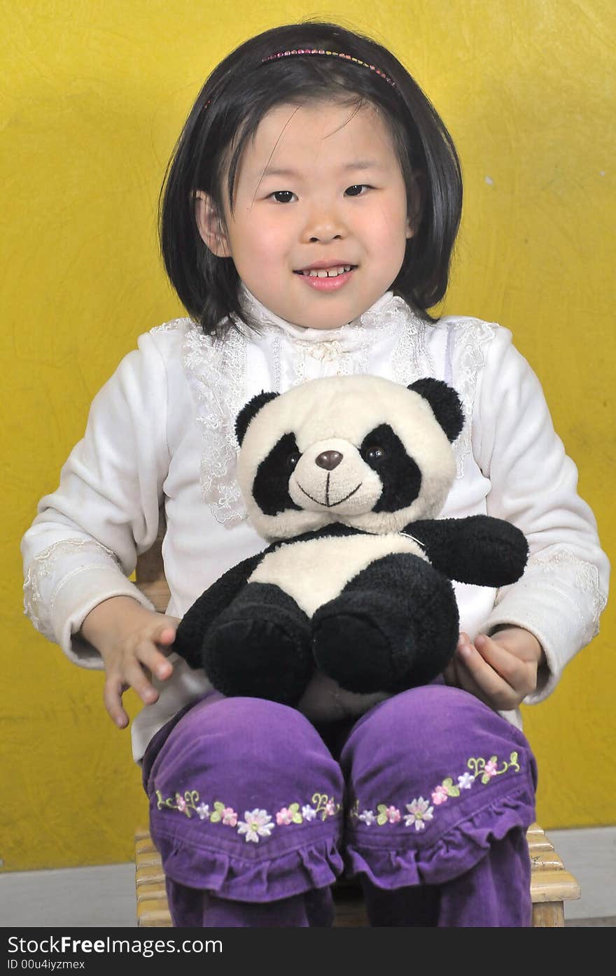 Girl With Panda Toys