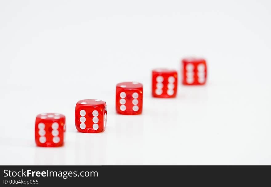 Red dice on a white background.