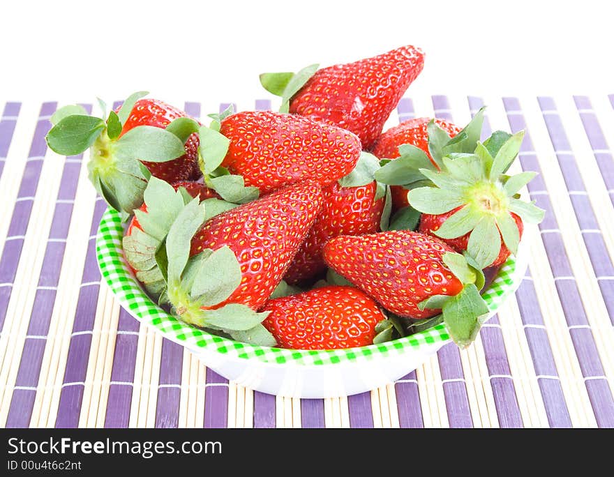 You have fresh strawberries in the bowl