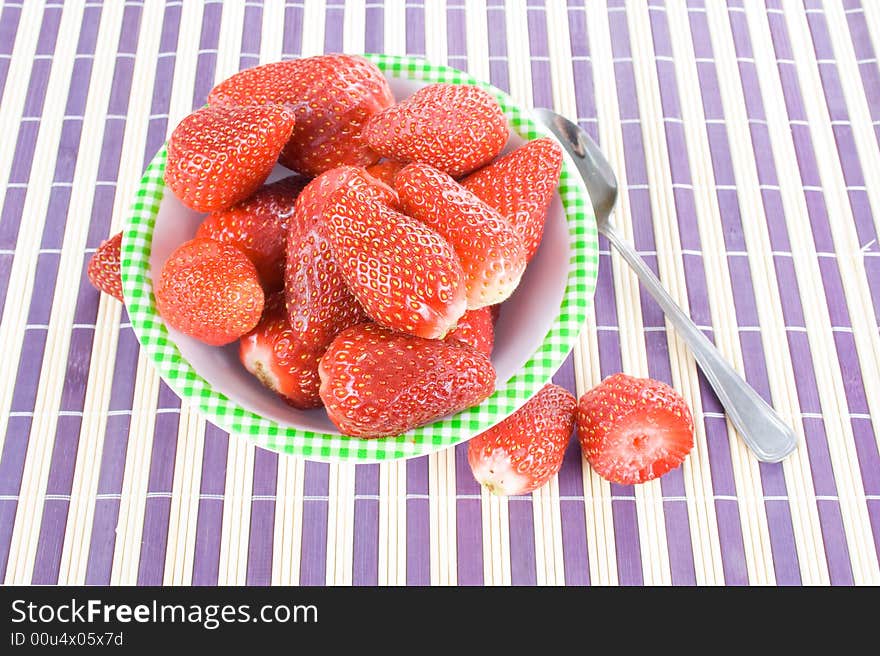 You have fresh strawberries in the bowl