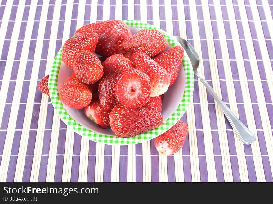 You have fresh strawberries in the bowl