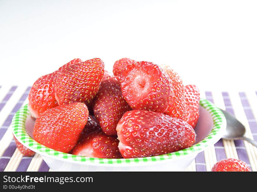 You have fresh strawberries in the bowl