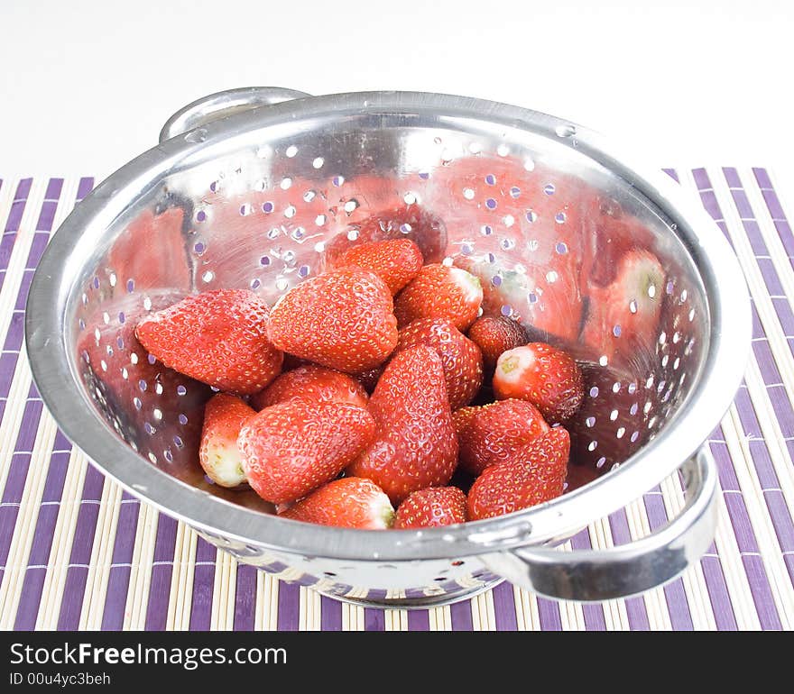 You have fresh strawberries in the bowl