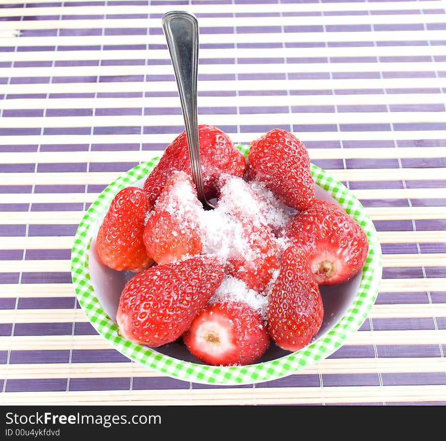 You have fresh strawberries in the bowl