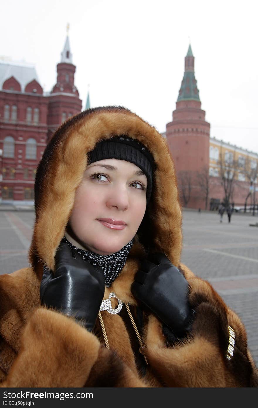 The girl posing on the Kremlin background. The girl posing on the Kremlin background