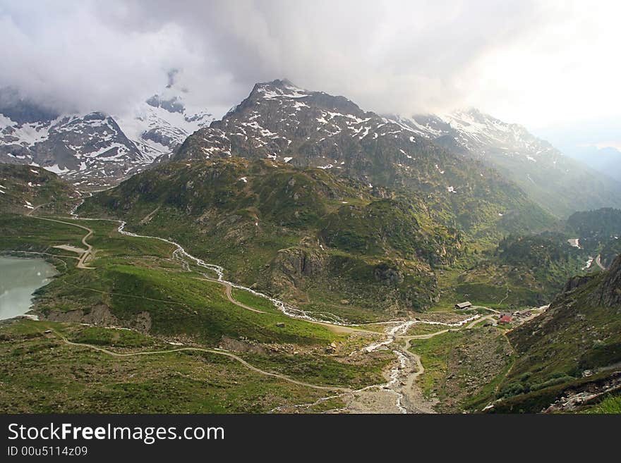 Hiking in spring swiss Alps, 2400 m. Hiking in spring swiss Alps, 2400 m