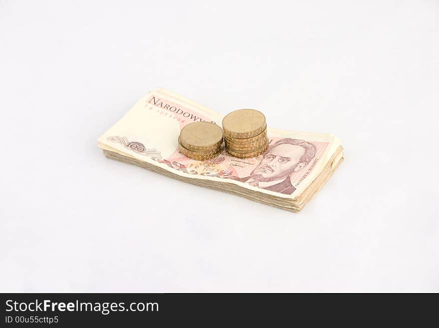 Banknotes and coins isolated on white background. Banknotes and coins isolated on white background.