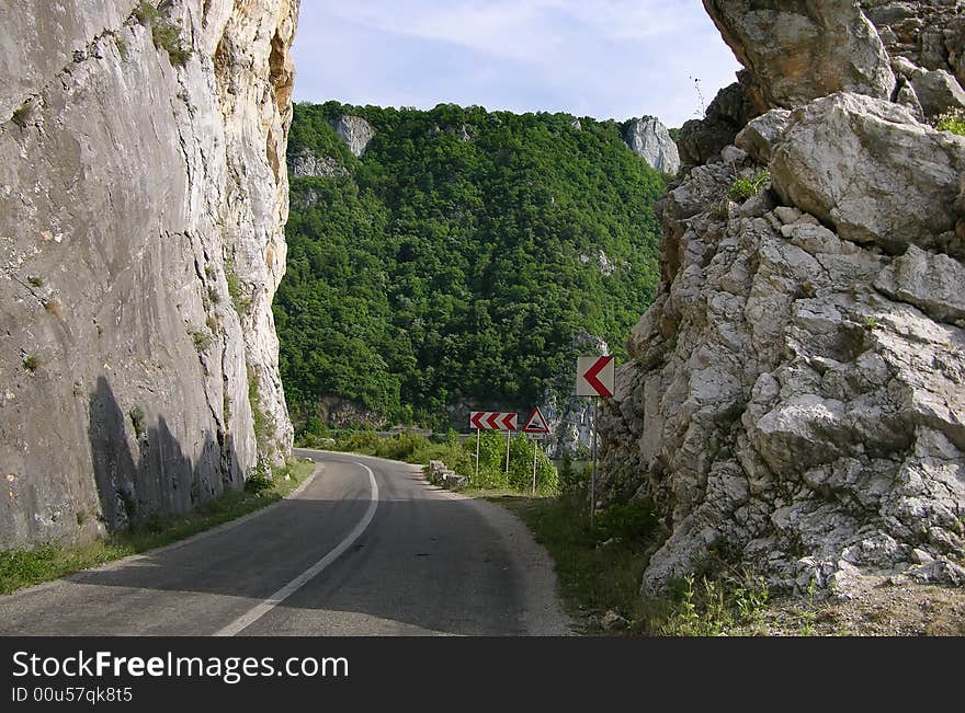 The road of Danube gorge is following the river, for 100 km. In the other side of the river si Serbia country. The road of Danube gorge is following the river, for 100 km. In the other side of the river si Serbia country.