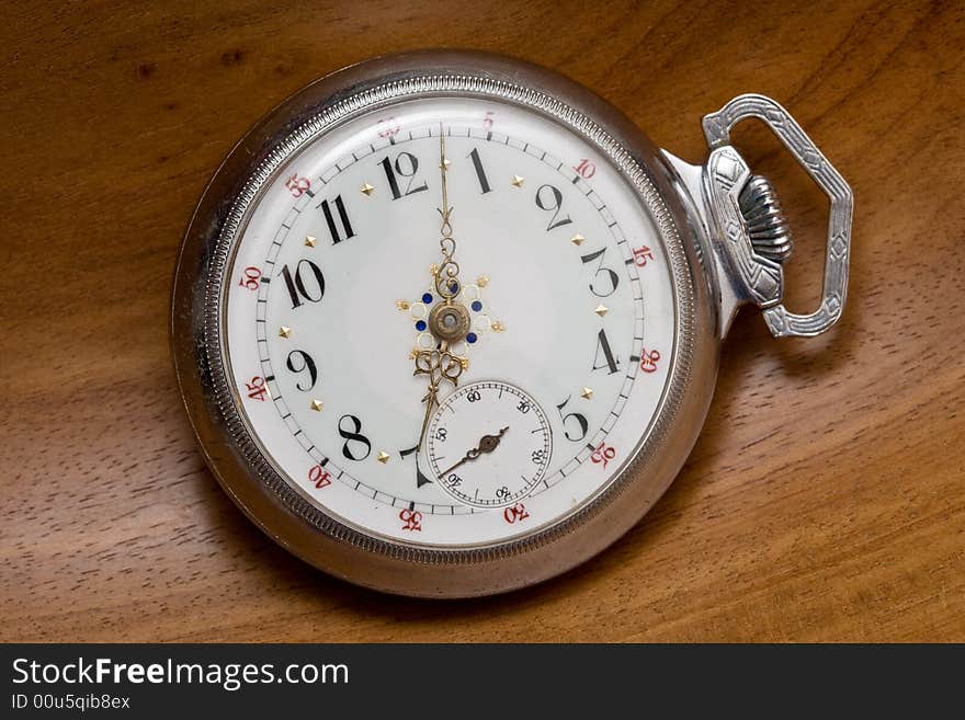 Close-up of an old pocket watch used by a railroad conductor. Close-up of an old pocket watch used by a railroad conductor