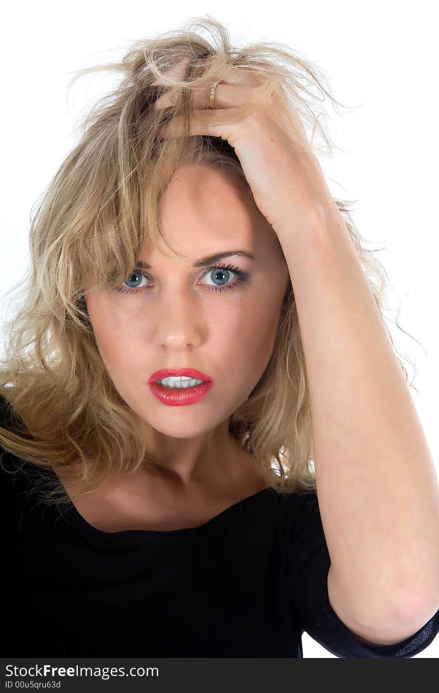 Portrait of the blonde with blue eye on white background