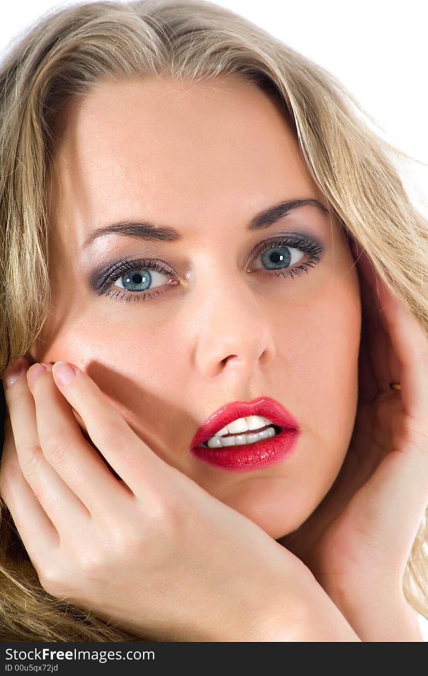 Portrait of the blonde with blue eye on white background