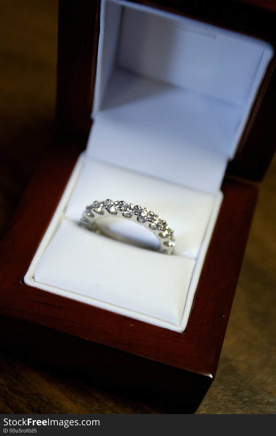 An image of bride's ring in box