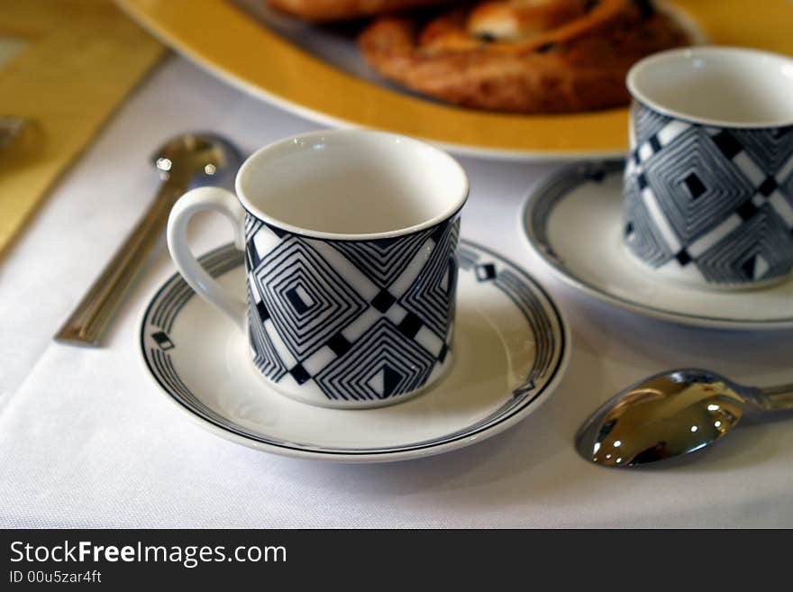 Breakfast table prepared for guests at a bed and breakfast place. Breakfast table prepared for guests at a bed and breakfast place.