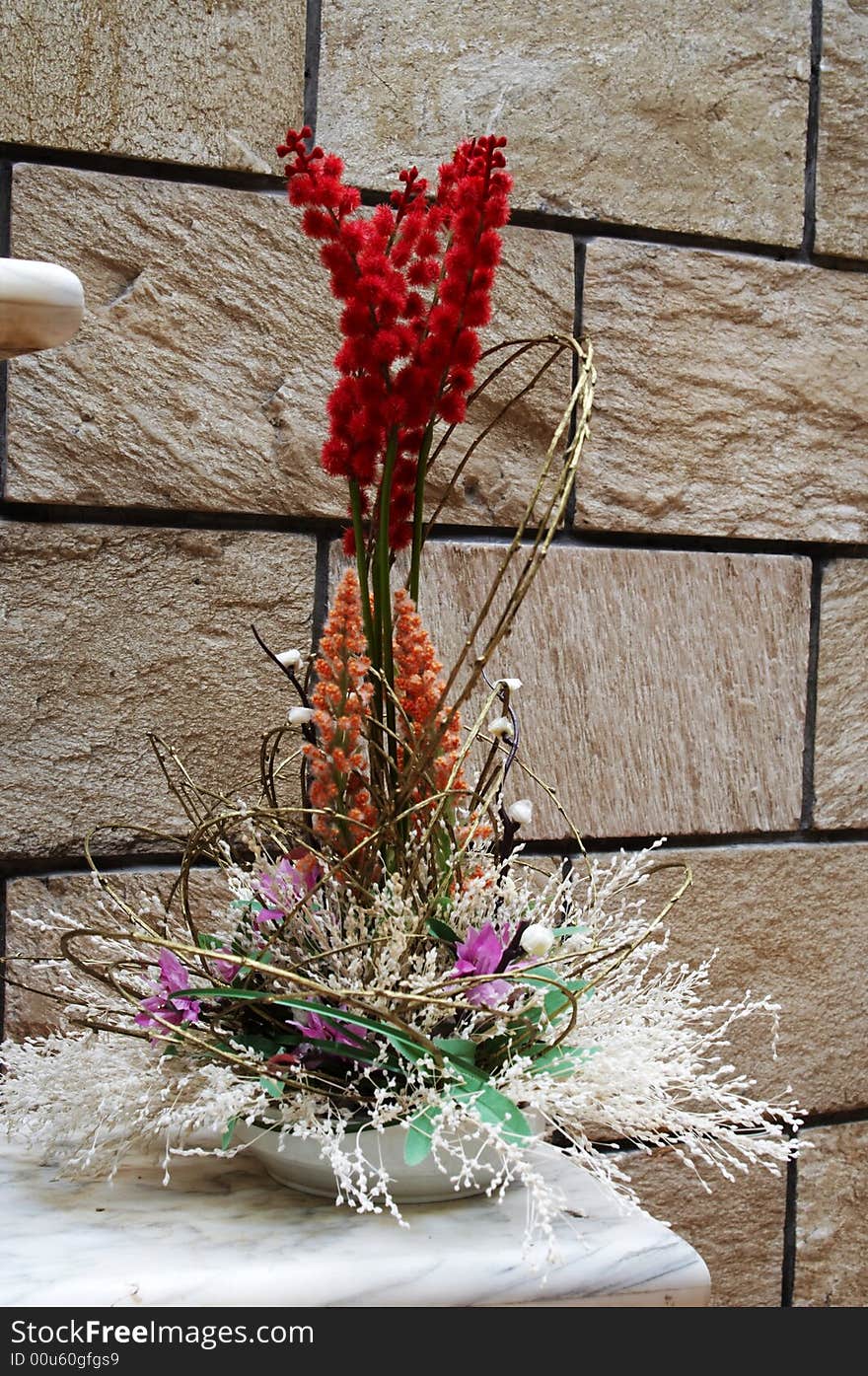 The Japanese art of formal flower arrangement with special regard shown to balance, harmony, and form. The Japanese art of formal flower arrangement with special regard shown to balance, harmony, and form.