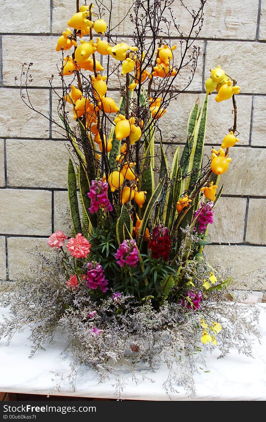 The Japanese art of formal flower arrangement with special regard shown to balance, harmony, and form. The Japanese art of formal flower arrangement with special regard shown to balance, harmony, and form.