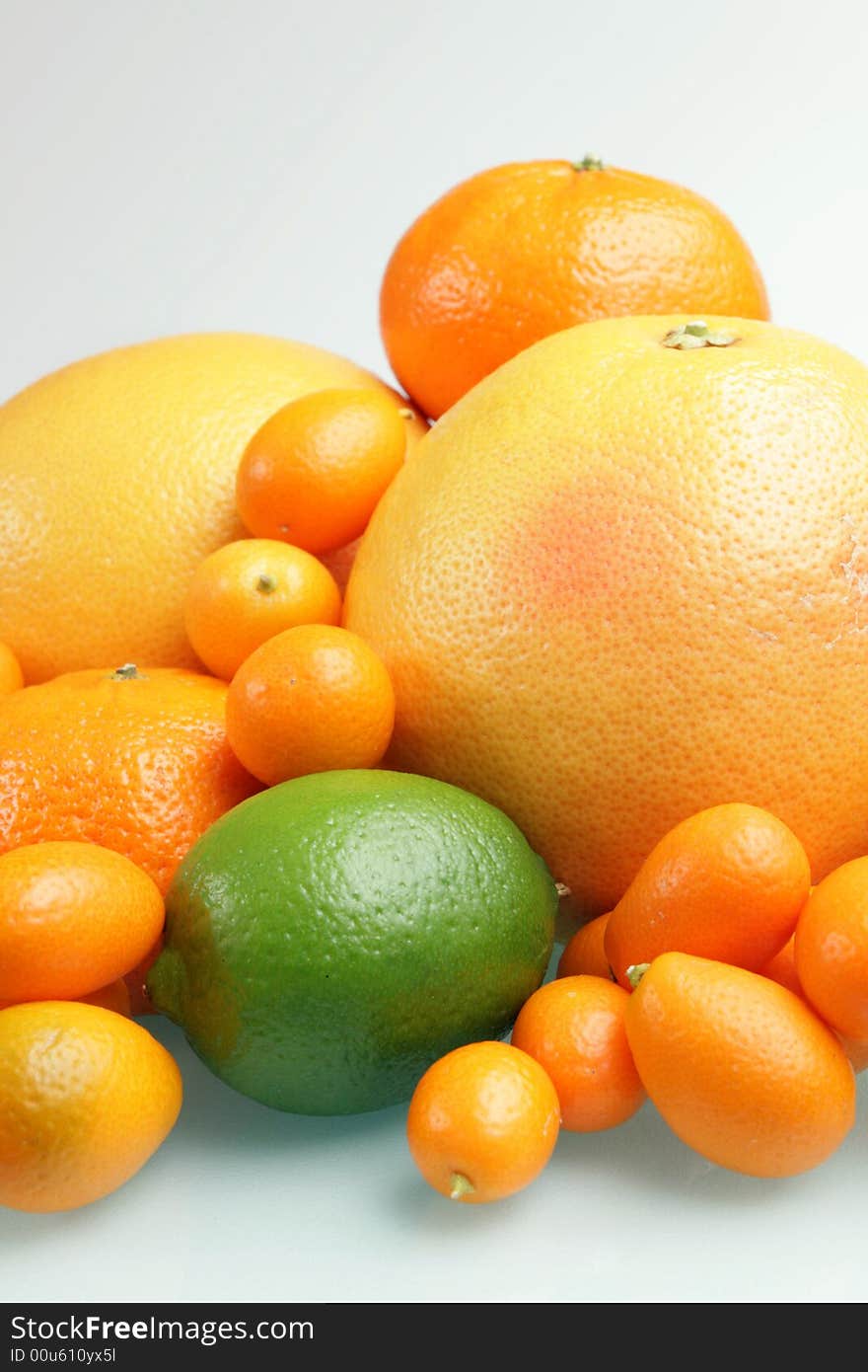 Citrus on a white glass table