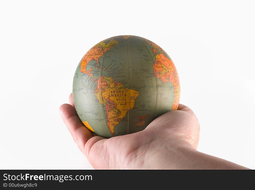 World in a male hand in a white background