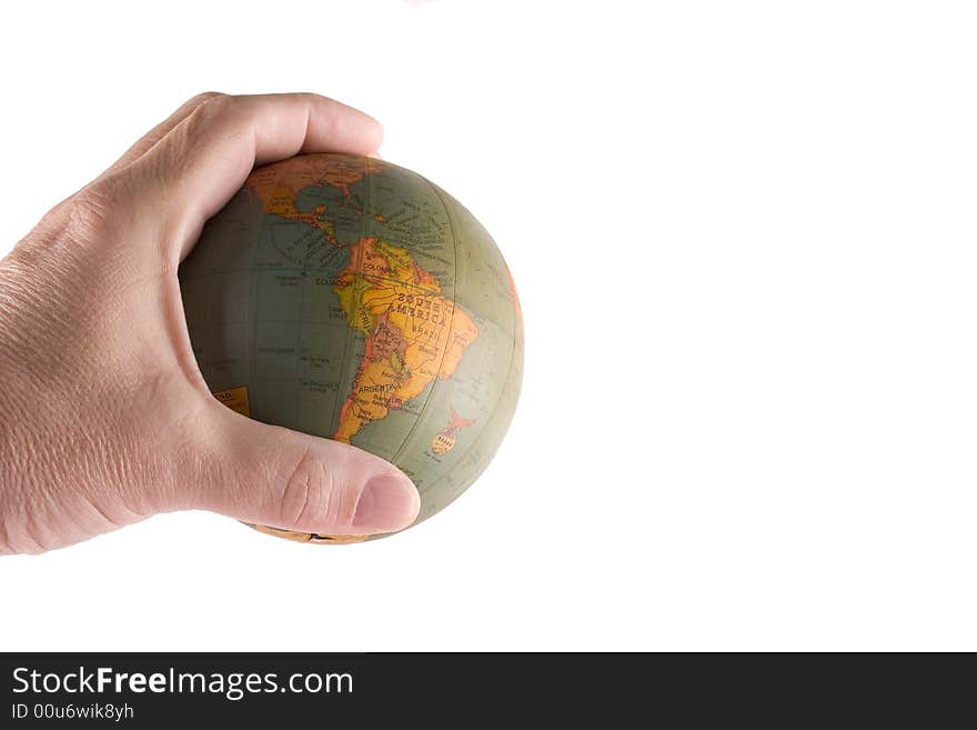 Male hand holding globe