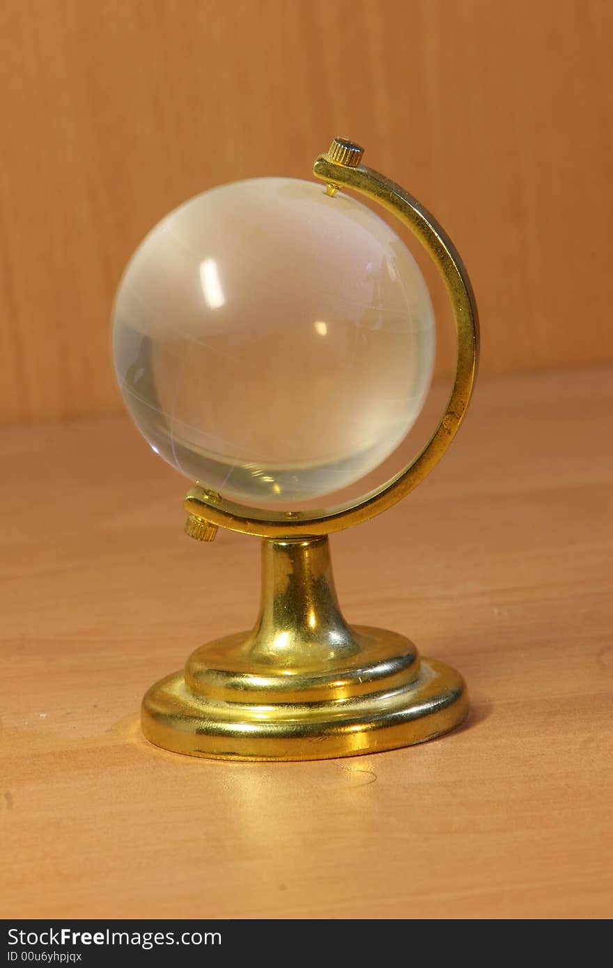 Crystal and Gold Globe paperweight. Crystal and Gold Globe paperweight.