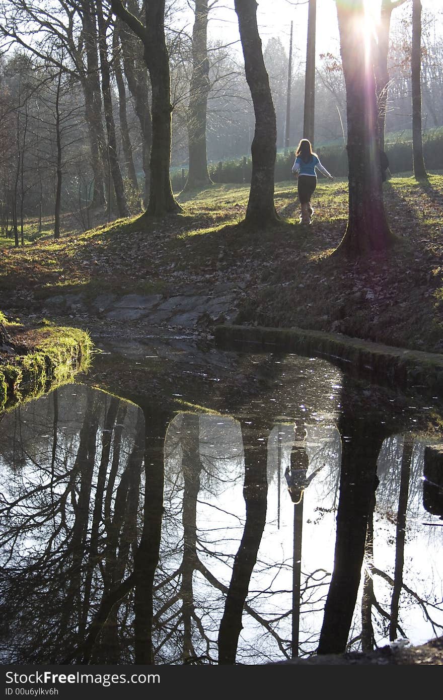 Lake with a woman in the background. Lake with a woman in the background