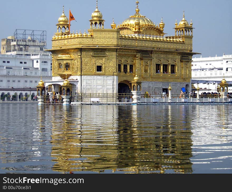 A teple for Sikh community to worship god made of Gold and is also surrounded by water. A teple for Sikh community to worship god made of Gold and is also surrounded by water