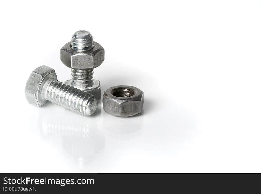 Two bolts and nuts on a white background