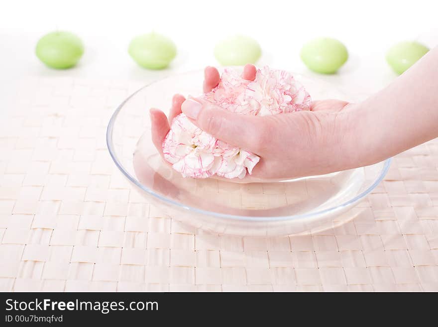 Female Hands In Bowl Full Of Water