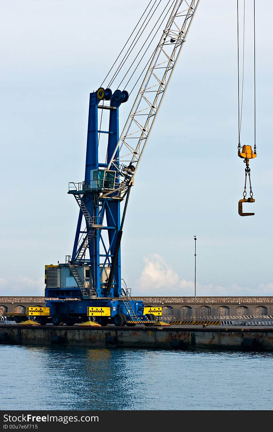 Crane in Piombino port, Tuscany, Italy. Crane in Piombino port, Tuscany, Italy.