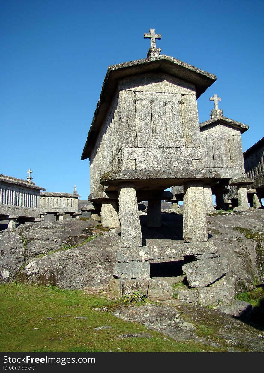 Espigueiros, group of old corn driers standing strong over the time drying corn for local populations of Soajo, Portugal. Espigueiros, group of old corn driers standing strong over the time drying corn for local populations of Soajo, Portugal