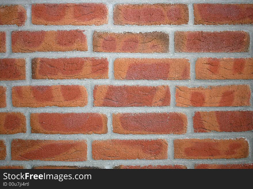 A wall of red bricks. A wall of red bricks