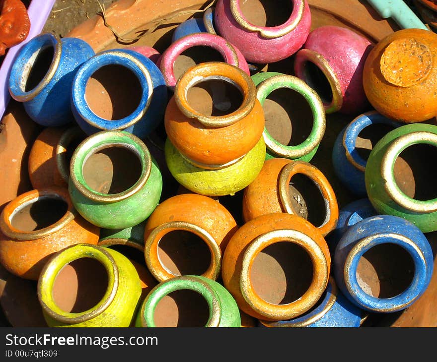 Stock of colored pots displayed into the market. Stock of colored pots displayed into the market