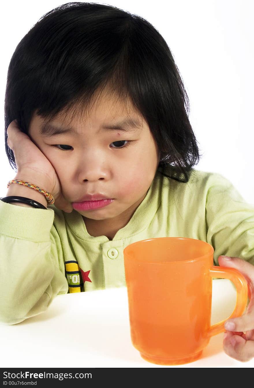 Asian kid take a cup with white background