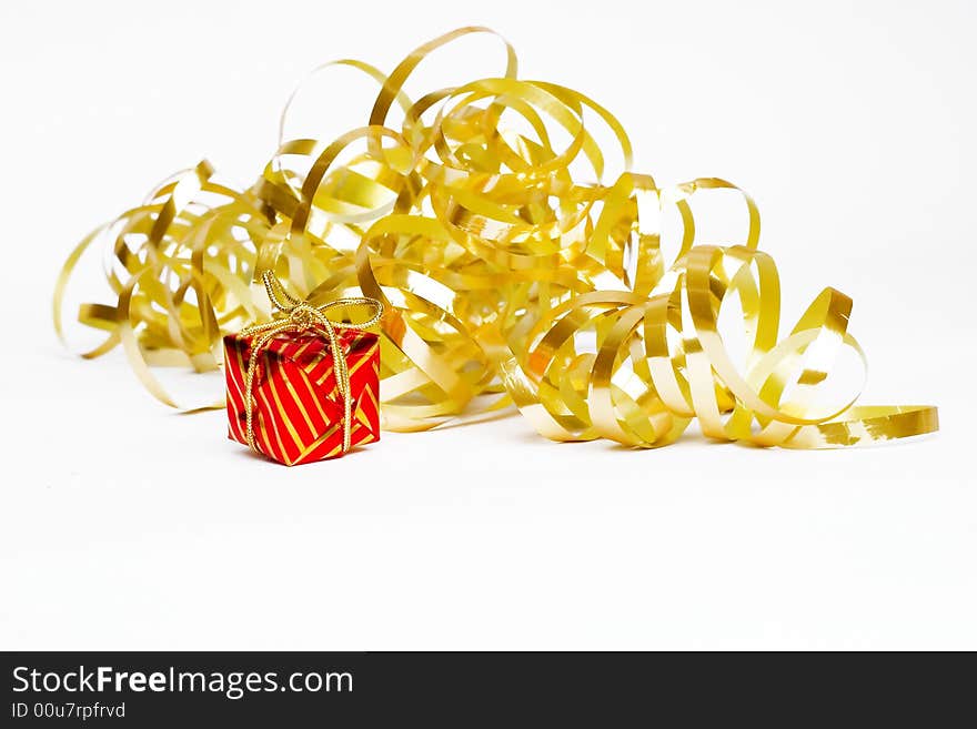 Christmas decoration - golden ribbon and small present