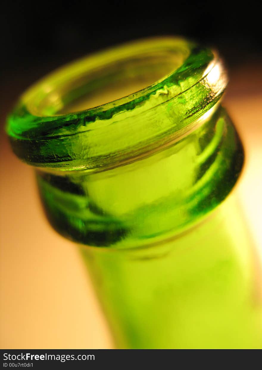 Open top of beer bottle, close up.