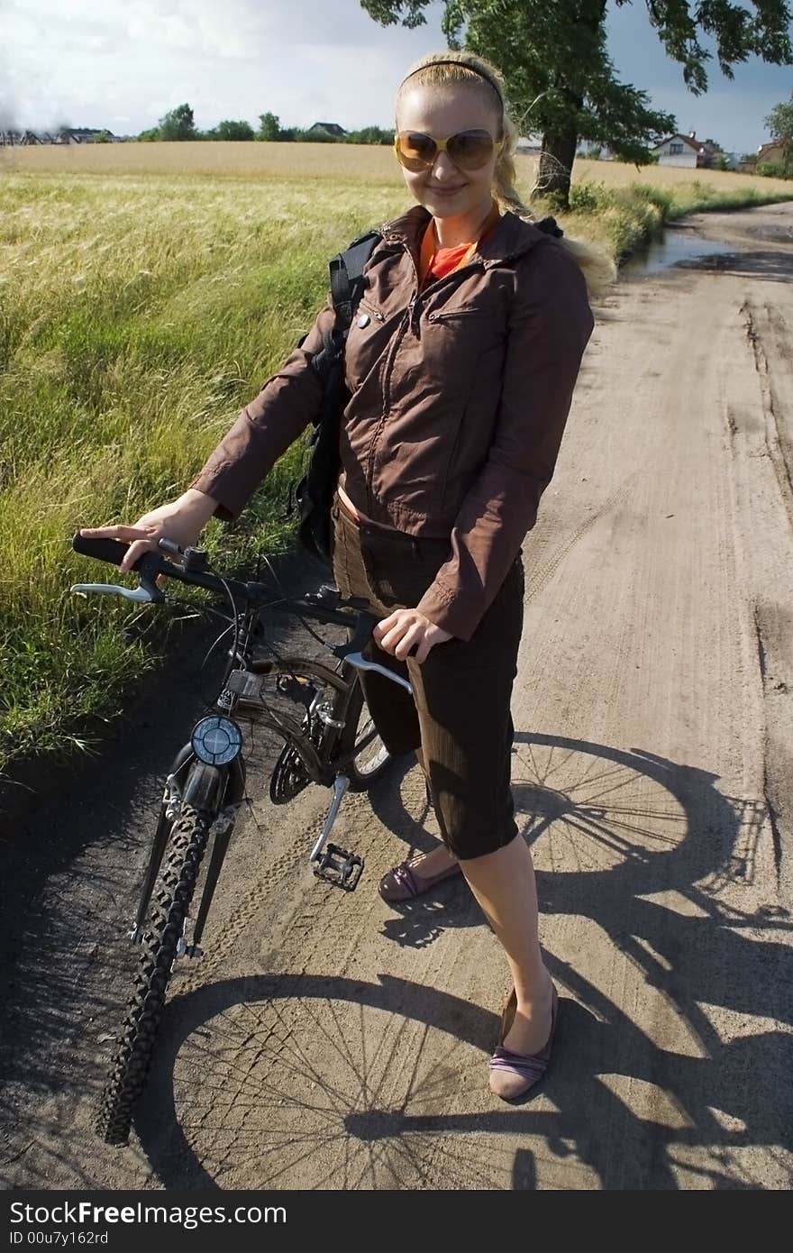 Girl with bicycle