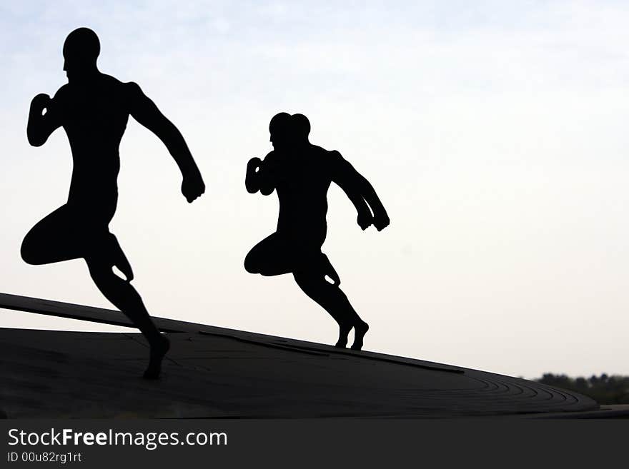 Conceptual photo about sportsmen running. Conceptual photo about sportsmen running