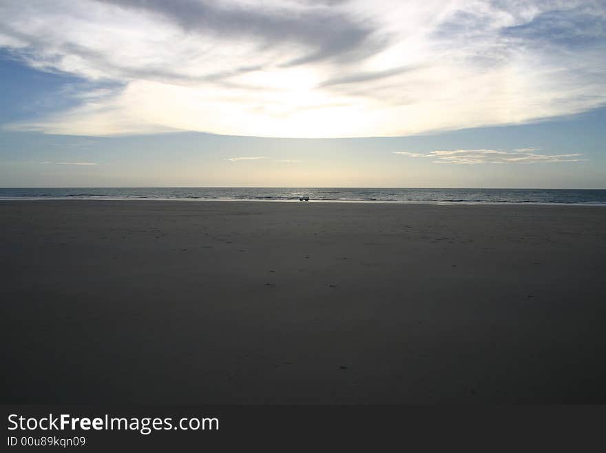 Car driving on a sandy beach. Australia. Car driving on a sandy beach. Australia.