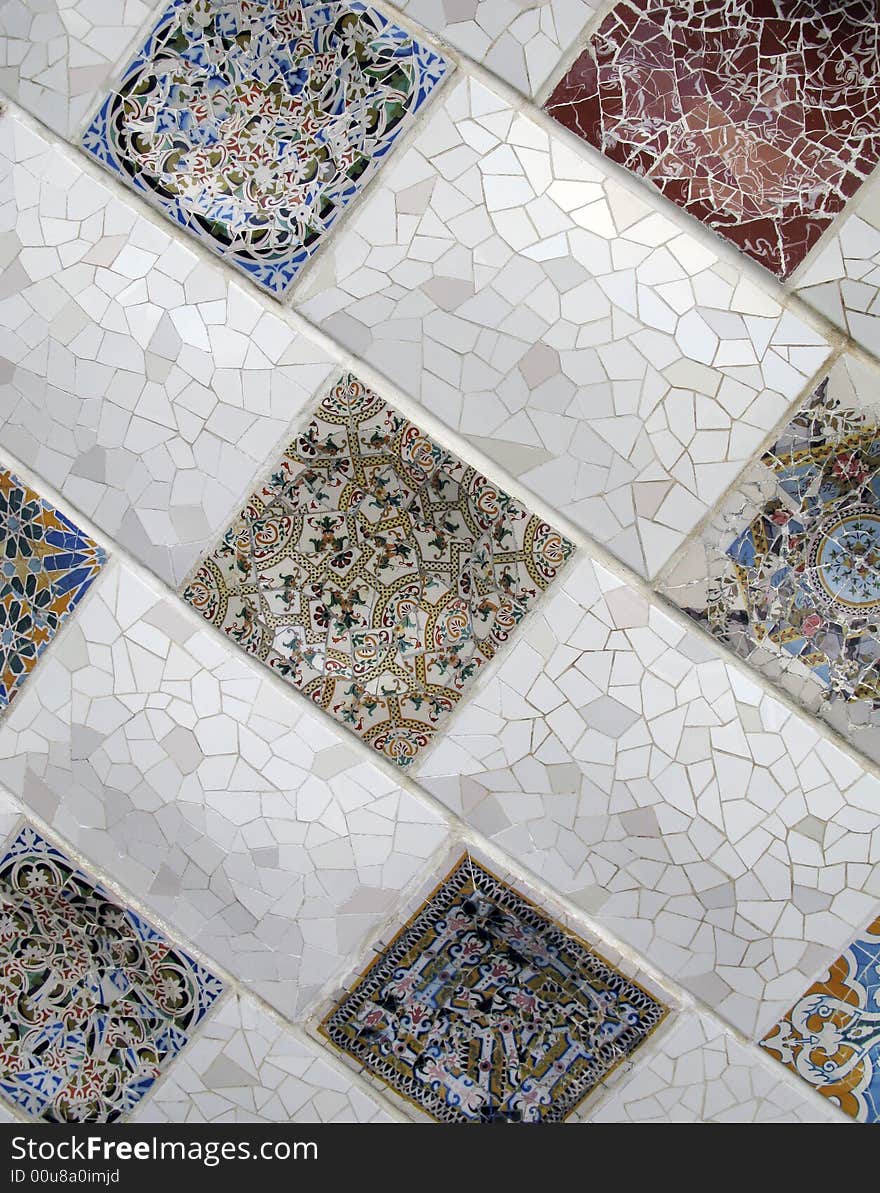 Close-up of Gaudi tiles in Guell Park in Barcelona. Close-up of Gaudi tiles in Guell Park in Barcelona