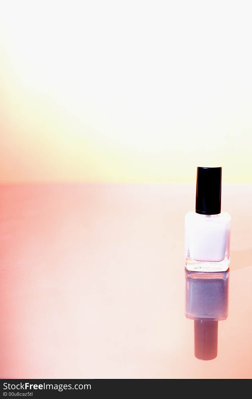 Bottle of nail polish on the sunshine background / copyspace