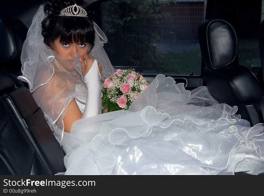 Portrait of a bride inside the car. Portrait of a bride inside the car