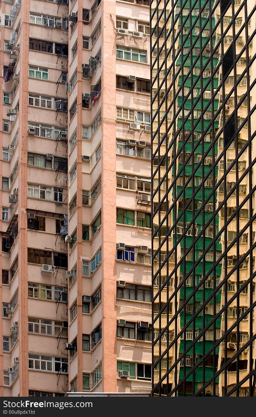 Old reflected in the new high rise blocks in Hong Kong. Old reflected in the new high rise blocks in Hong Kong