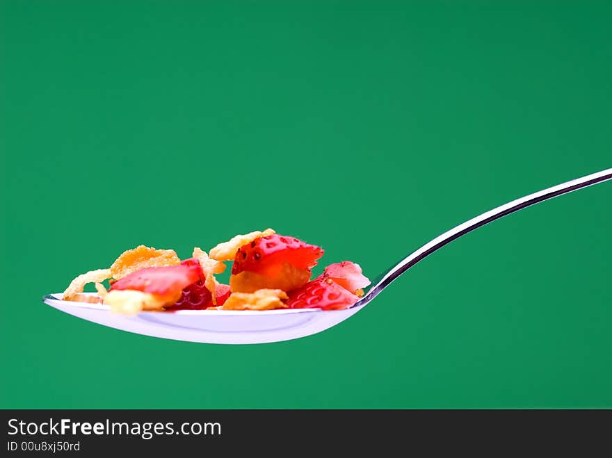 Cereal With Strawberries On A Spoon