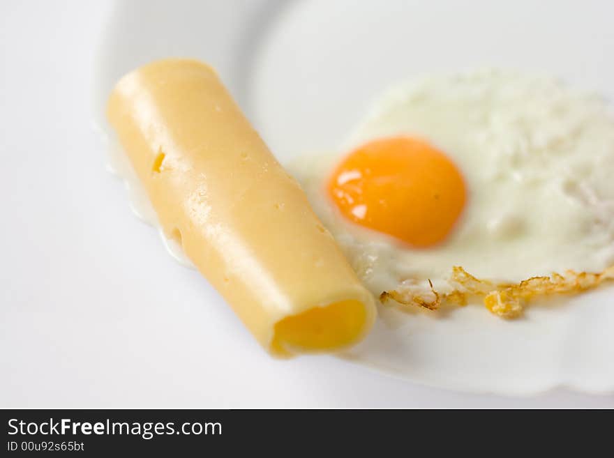 Omelet and cheese on a plate. Omelet and cheese on a plate