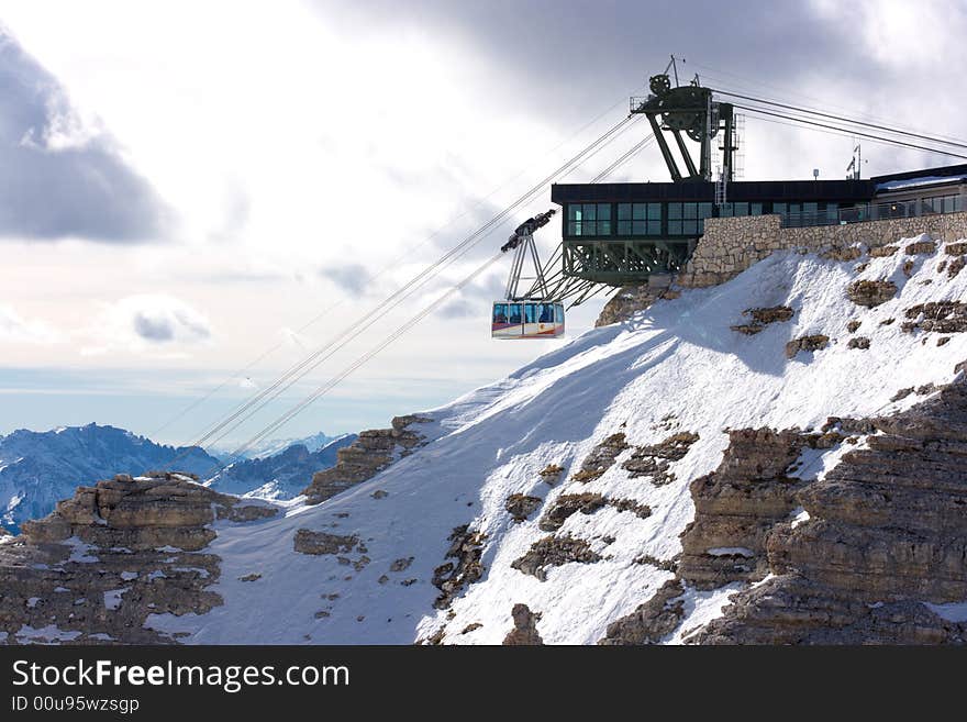 Cablecar arriving or departing from station in the mountains