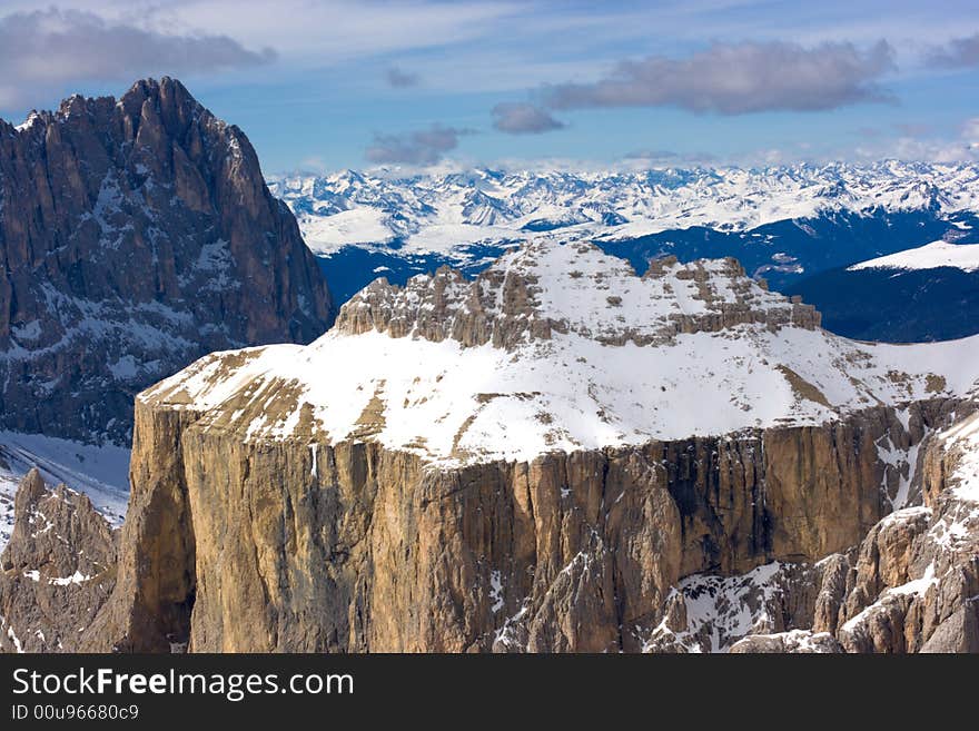 Beautiful winter mountain landscape in Italian Dolomites. Fassa Valley, popular ski resort.