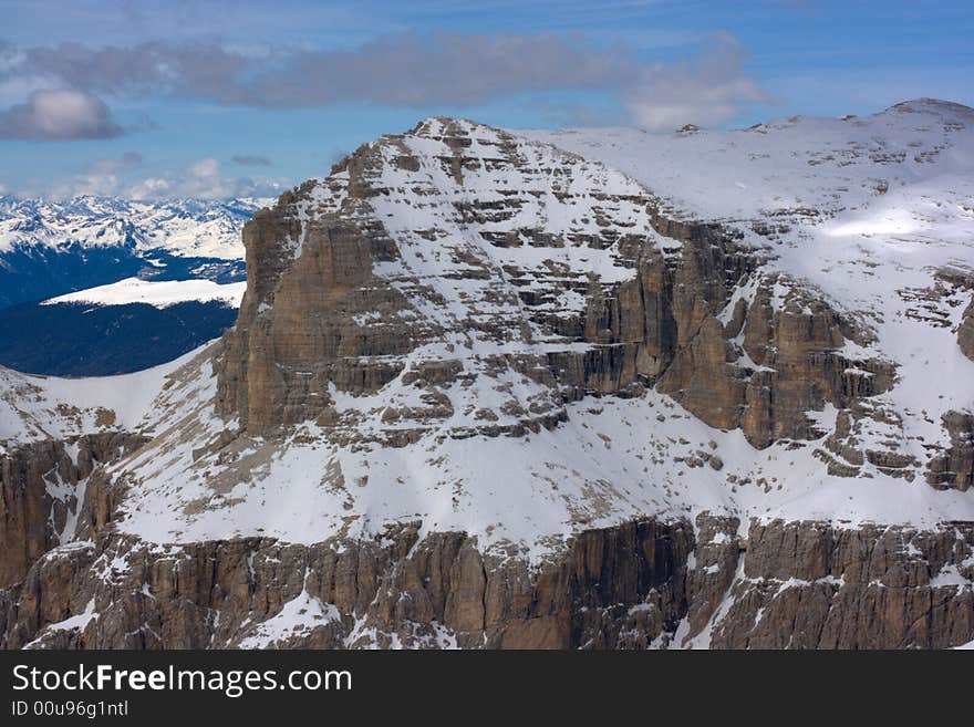 Beautiful winter mountain landscape in Italian Dolomites. Fassa Valley, popular ski resort.