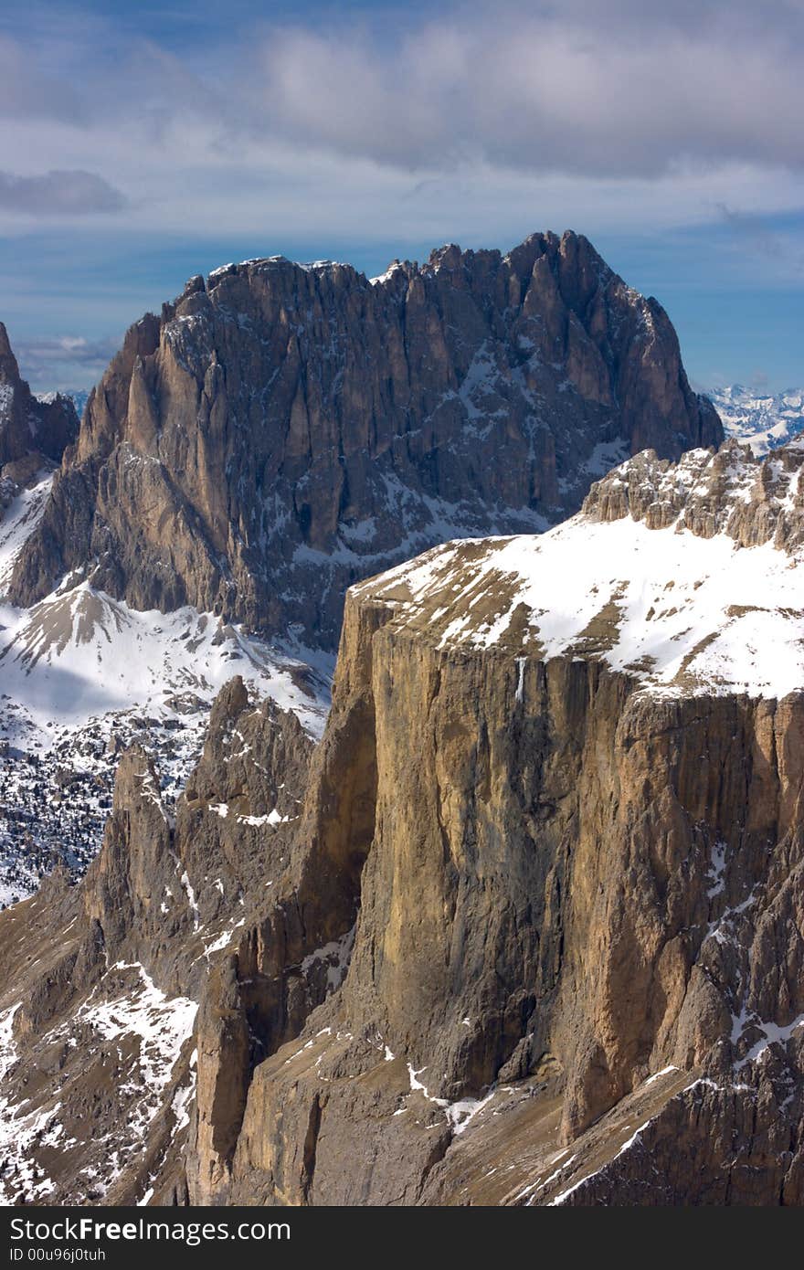 Beautiful winter mountain landscape in Italian Dolomites. Fassa Valley, popular ski resort.