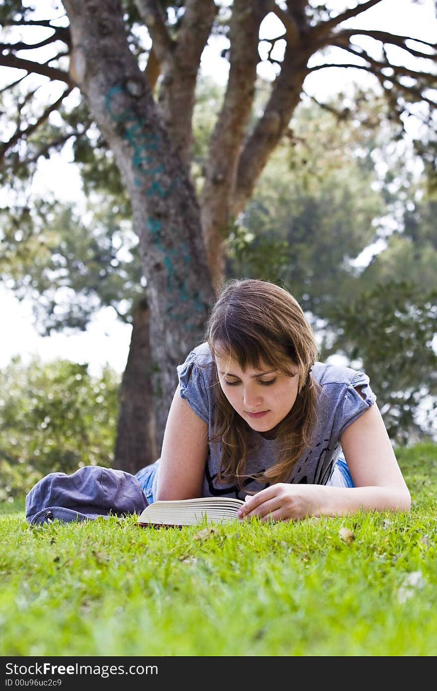 Young Woman Reading A Book