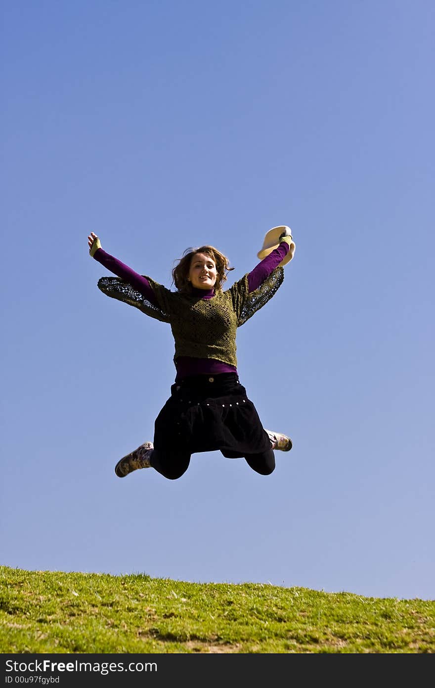 Young woman jumping